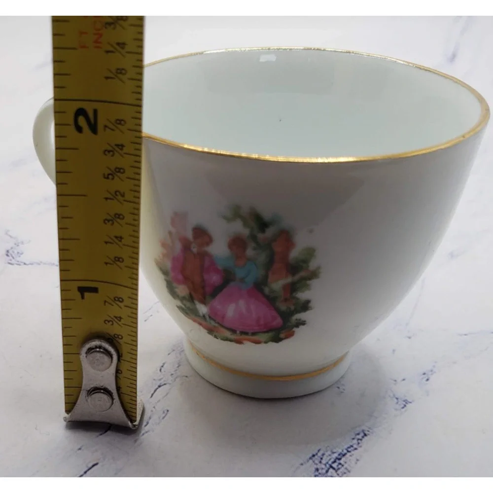 Vintage Porcelain Tea Cup and Saucer White w/Gold Trim and Dancing Couple